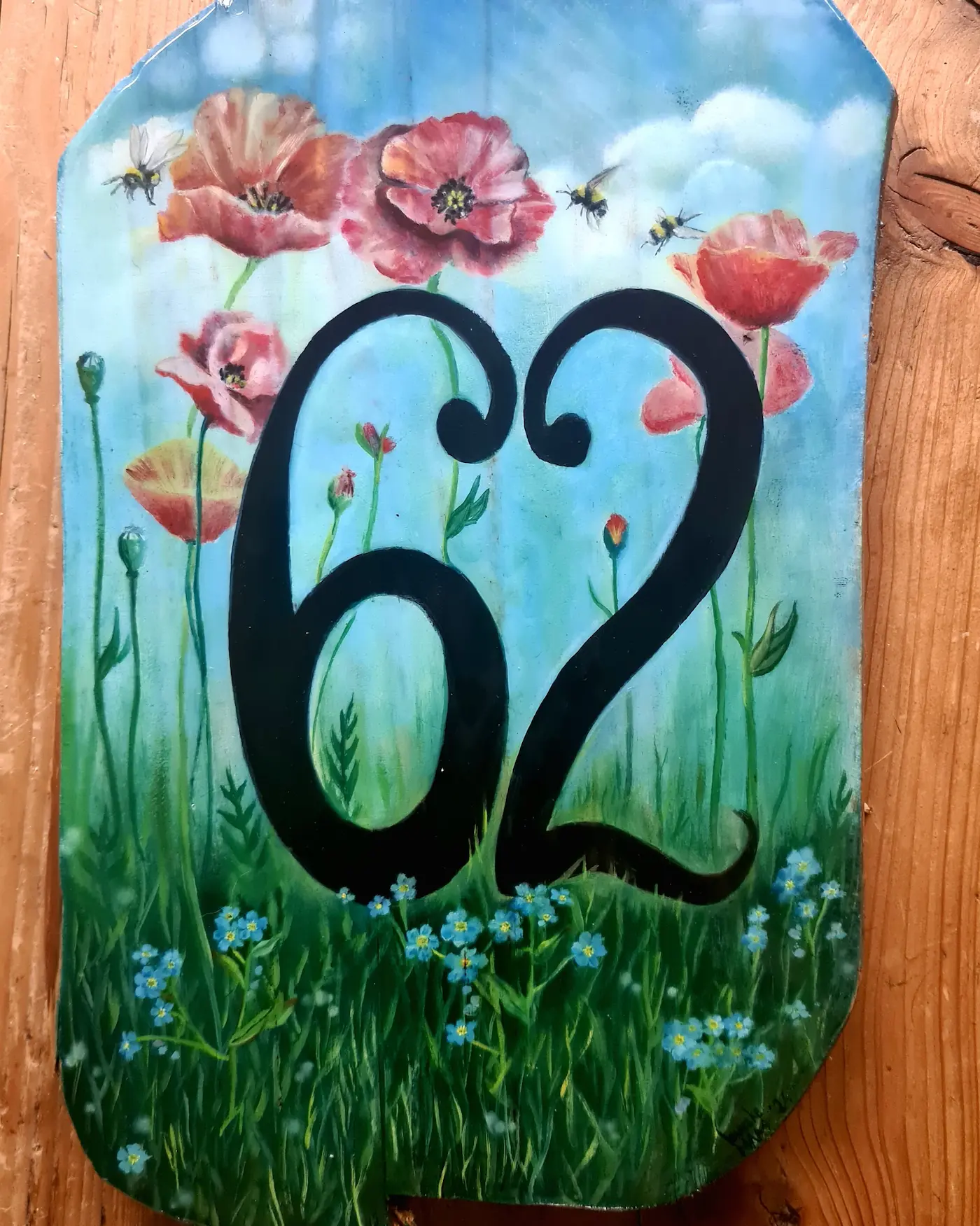 Huisnummerbord met thema bloemen